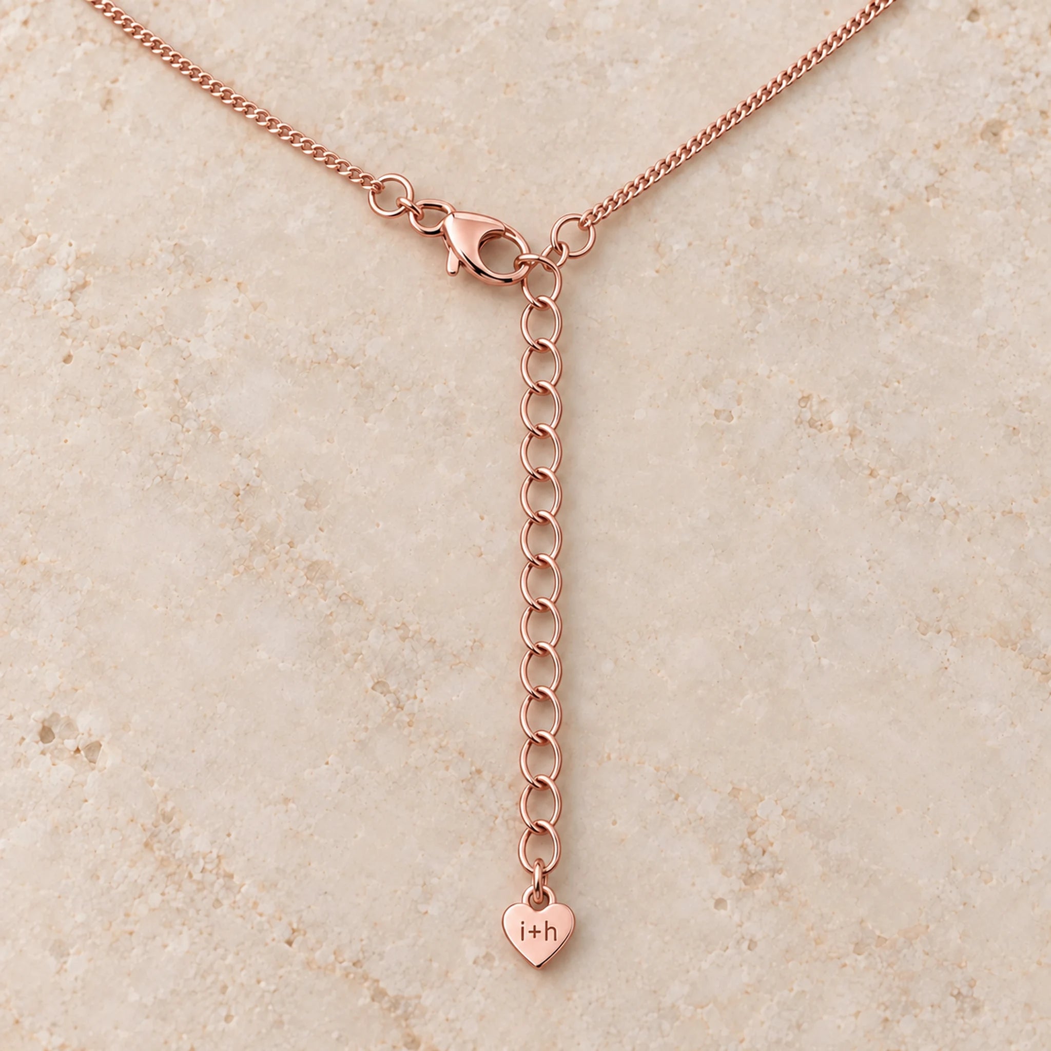 9k rose gold curb chain clasp and 2 inch extender with i+h heart tag