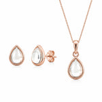 Rose Gold April Birthstone Jewellery set featuring Clear Quartz Stud Earrings and matching Clear Quartz pendant necklace on a white background