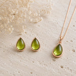 Rose Gold August Birthstone Peridot Jewellery Set featuring natural peridot earrings and matching peridot necklace.
