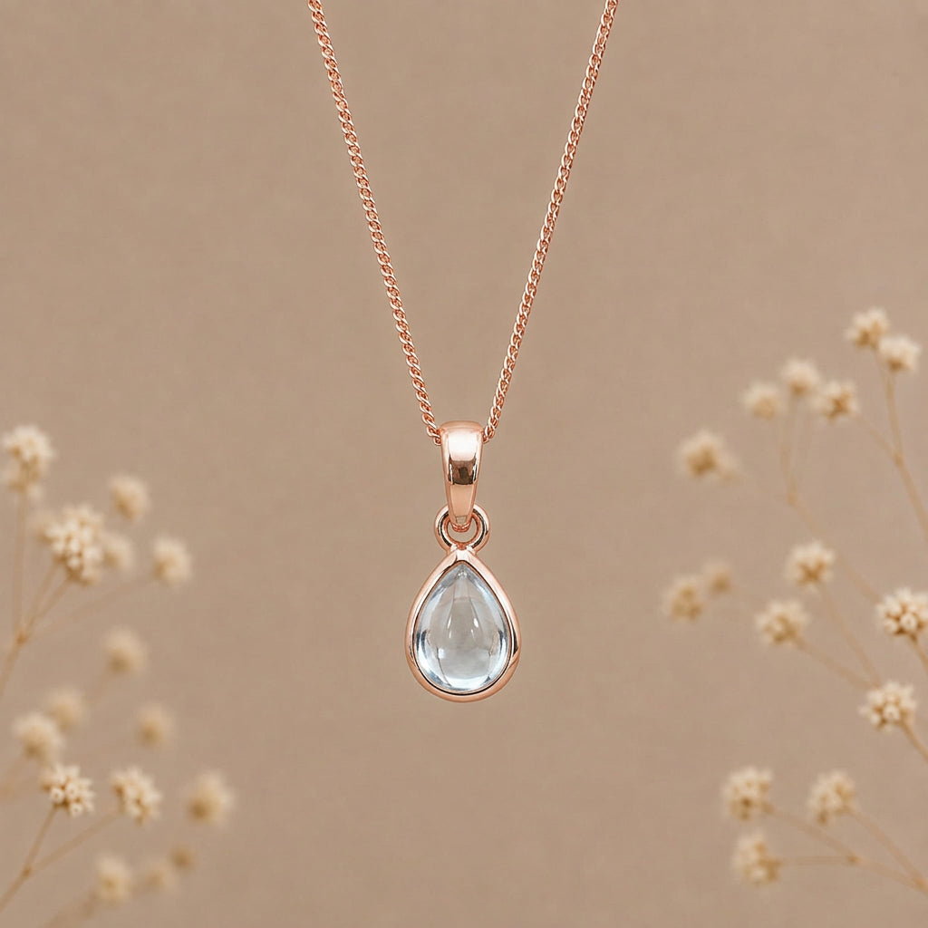 Rose gold November birthstone blue topaz pendant necklace