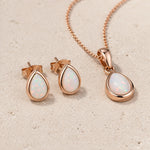 Rose Gold October Birthstone opal Jewellery set including pear-shaped opal stud earrings and opal pendant necklace