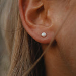 woman wearing dainty rose gold opal earrings - womens white opal jewellery australia - australian jewellery online