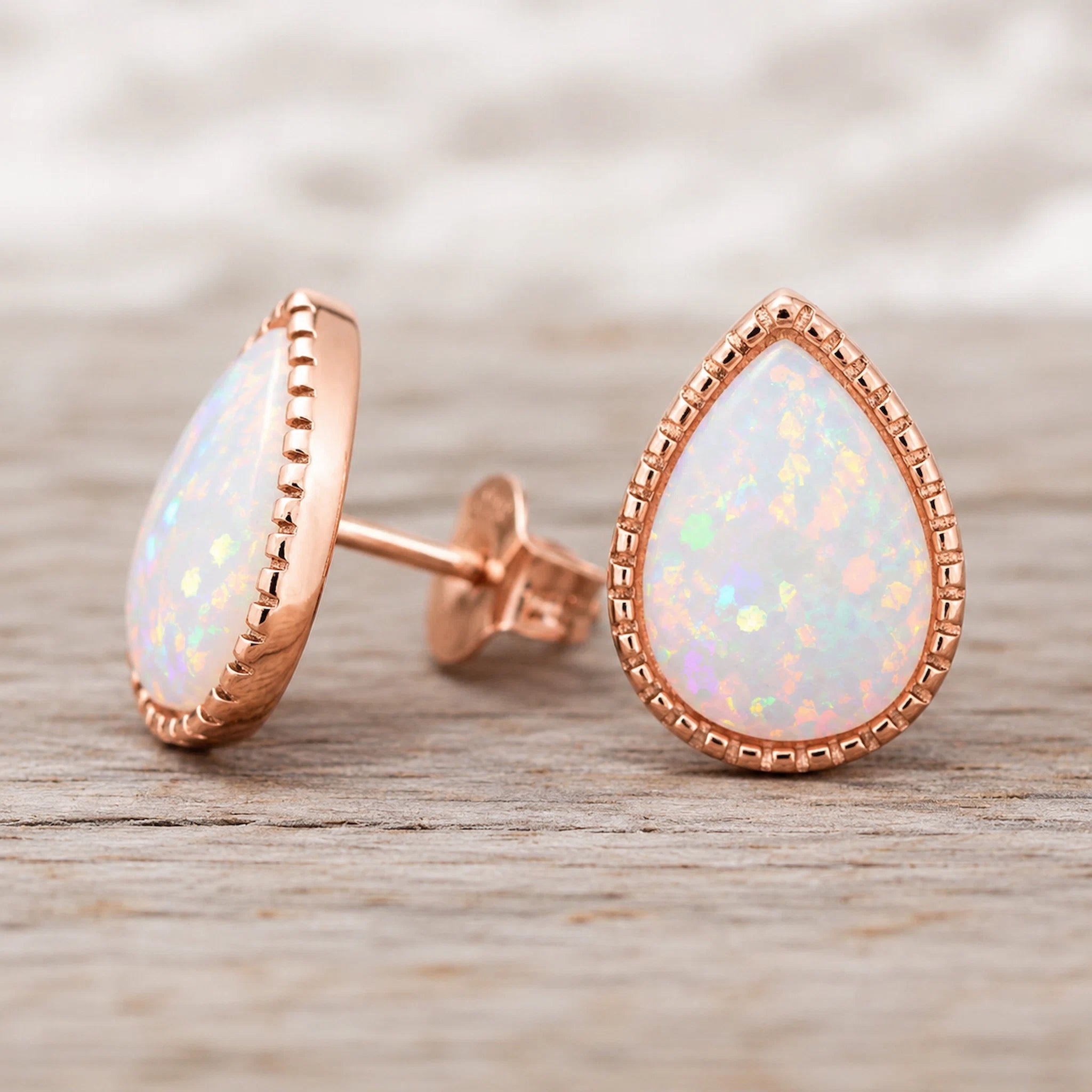 rose gold teardop white opal earrings