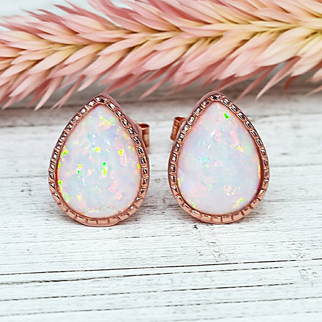rose gold tear drop white opal stud earrings by indie and harper australia