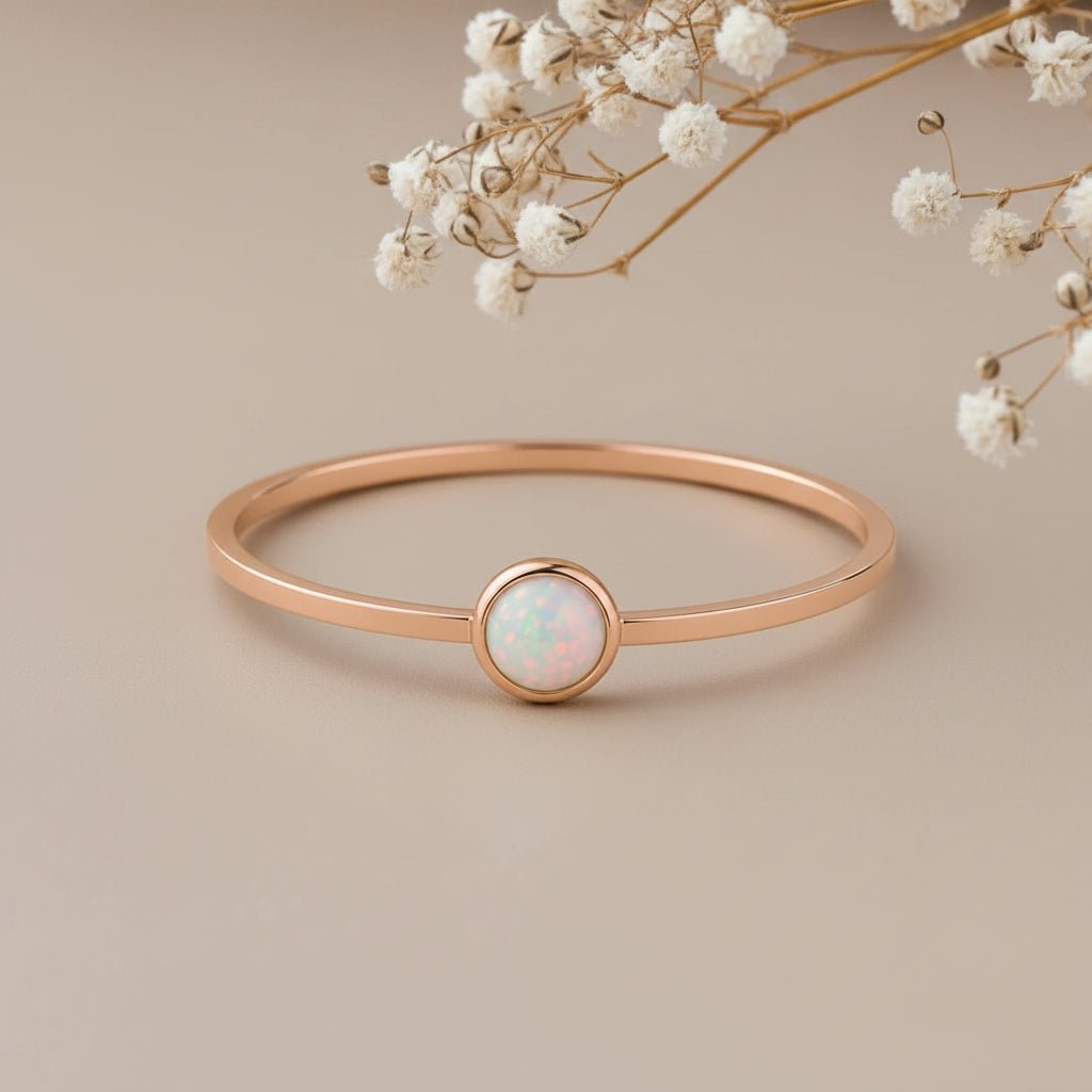Rose Gold White Opal Ring with 4mm round bezel-set white opal on a dainty rose gold plated sterling silver band