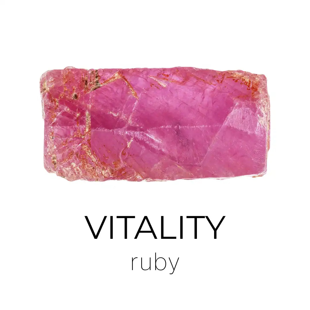 Raw ruby crystal with the word 'Vitality' and 'ruby' text on a white background