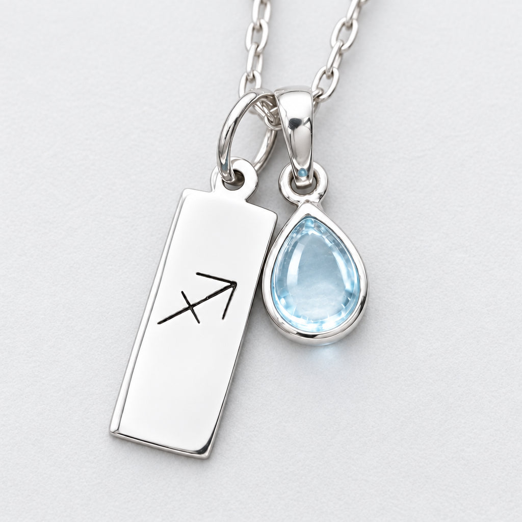 Sterling silver Sagittarius birthstone necklace with a November topaz on grey