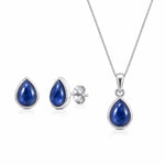 Sterling Silver September Birthstone jewellery set featuring a teardrop-shaped natural blue sapphire pendant necklace and matching stud sapphire earrings, displayed on a clean white background