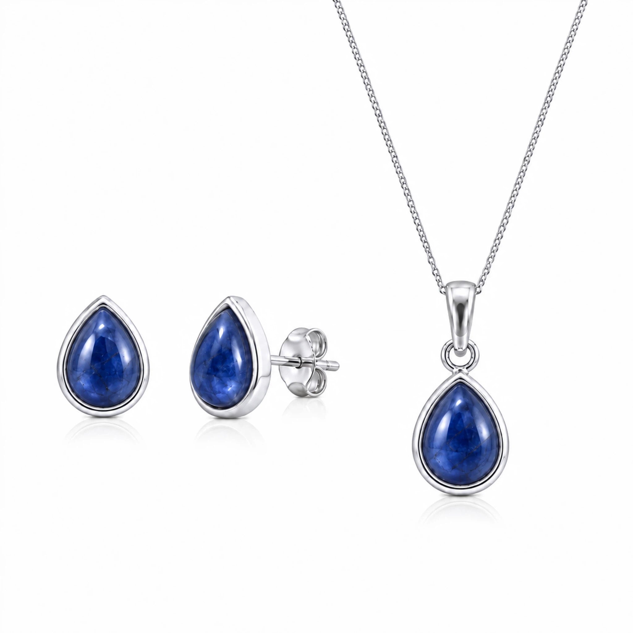 Sterling Silver September Birthstone jewellery set featuring a teardrop-shaped natural blue sapphire pendant necklace and matching stud sapphire earrings, displayed on a clean white background