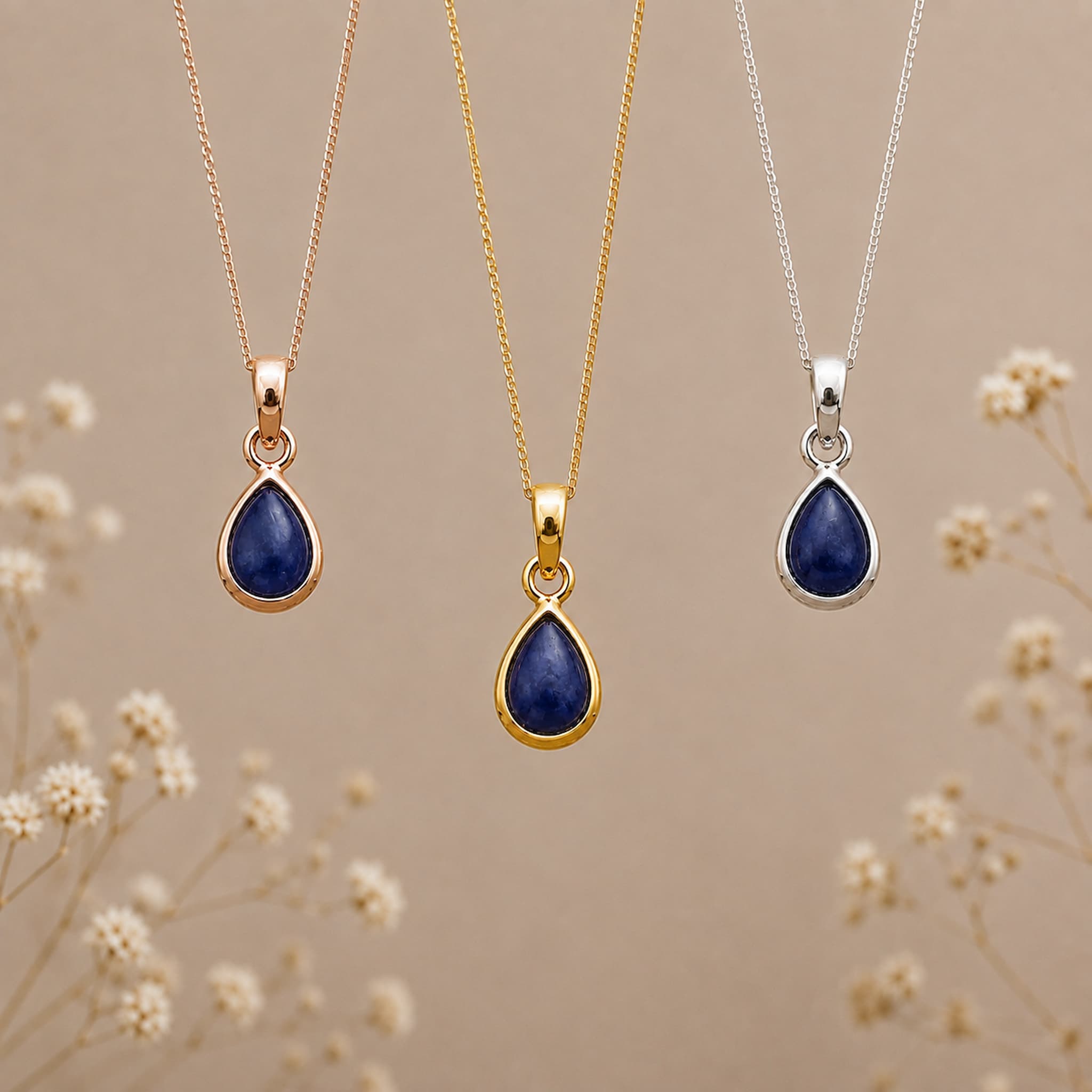three september birthstone natural sapphire teardrop pendant necklaces in rose gold, gold and silver