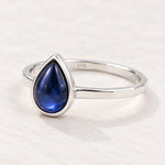 Angled sterling silver September natural sapphire birthstone ring