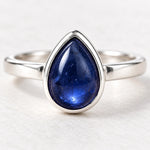 Close-up of sterling silver September natural sapphire birthstone ring