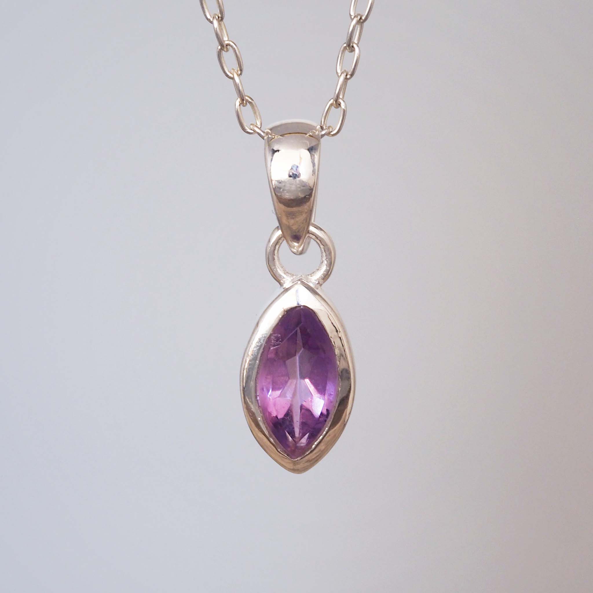 sterling silver amethyst necklace with natural faceted marquise shaped amethyst gemstone in minimalist boho design