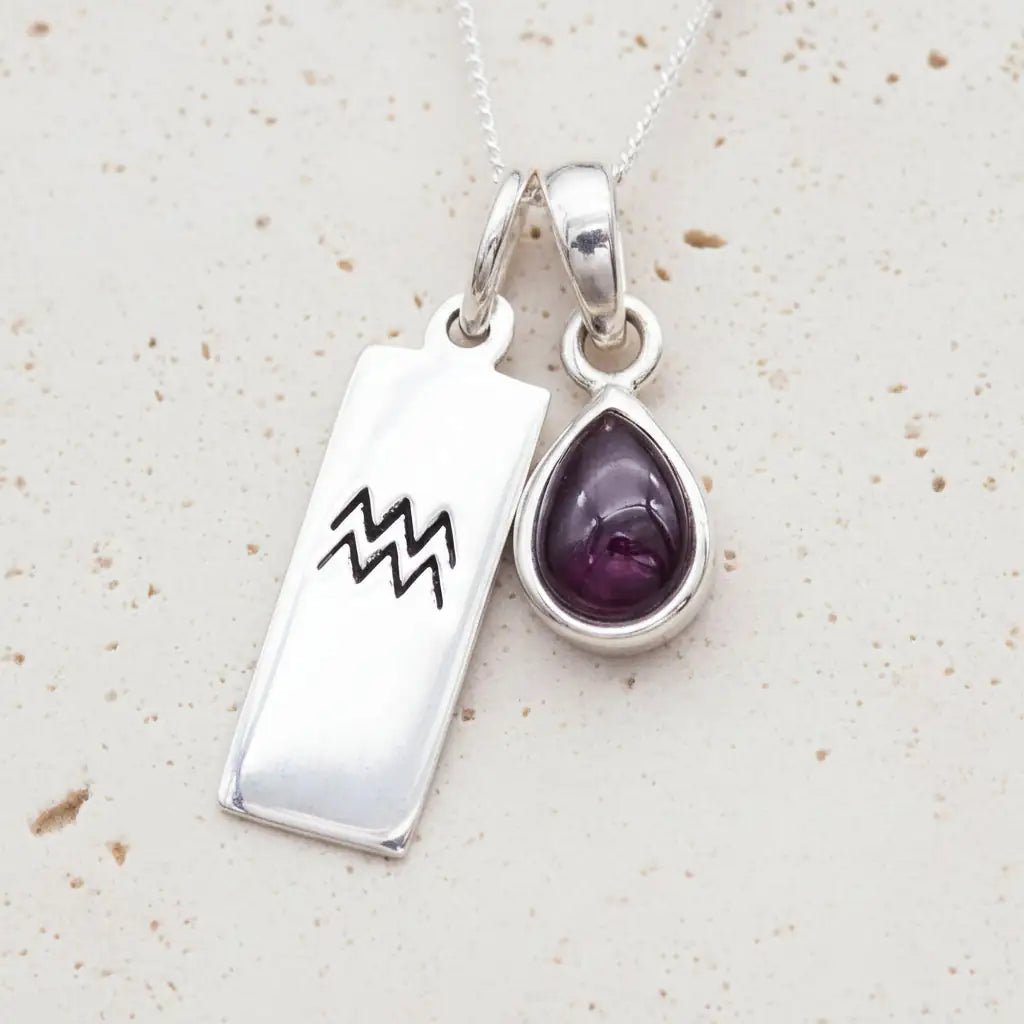 Sterling Silver January Birthstone Necklace with a pear-shaped natural Garnet gemstone pendant and Aquarius Zodiac pendant