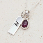 Sterling Silver January Birthstone Necklace with a pear-shaped natural Garnet gemstone pendant and Aquarius Zodiac pendant