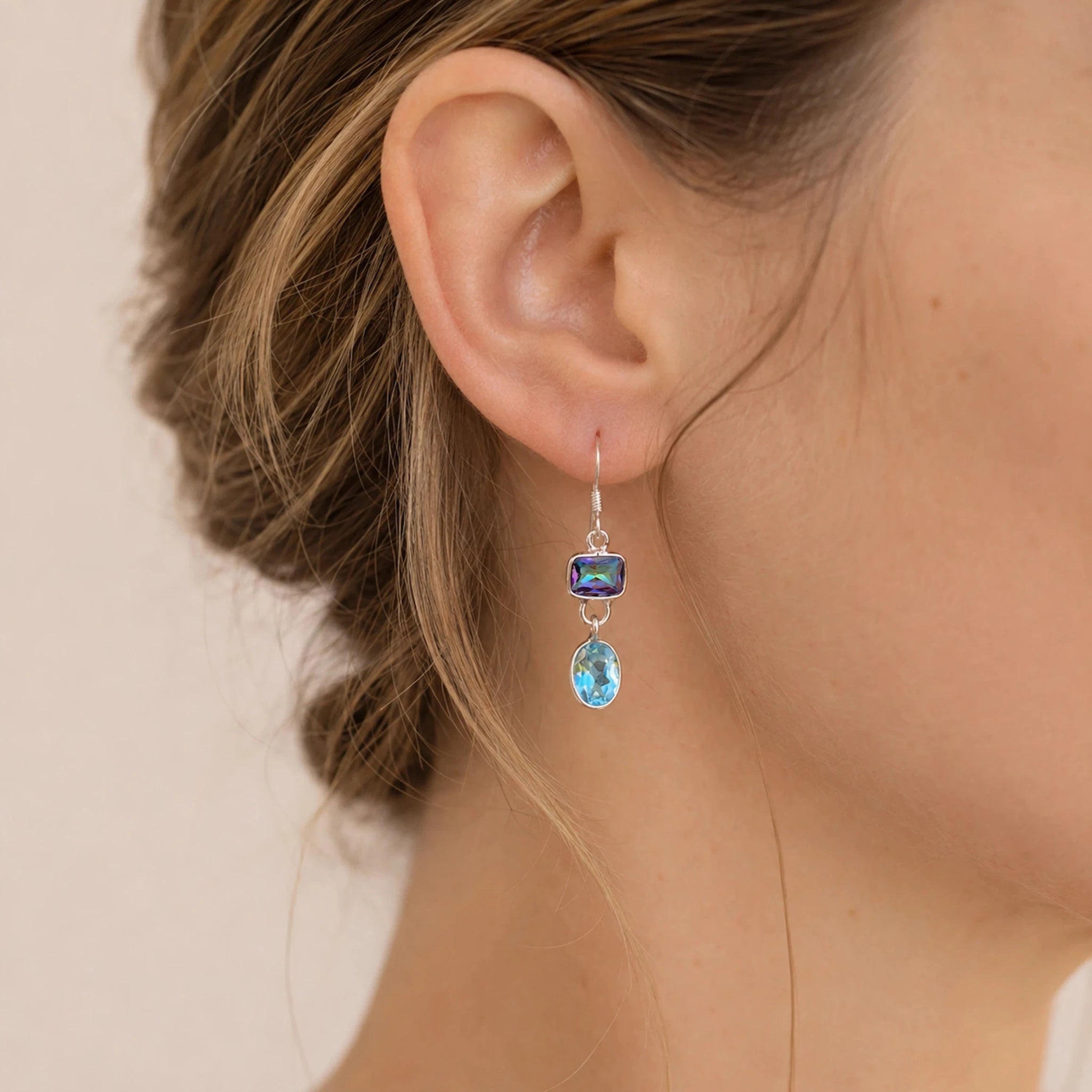 sterling silver french hook earrings worn with natural blue topaz and mystic quartz