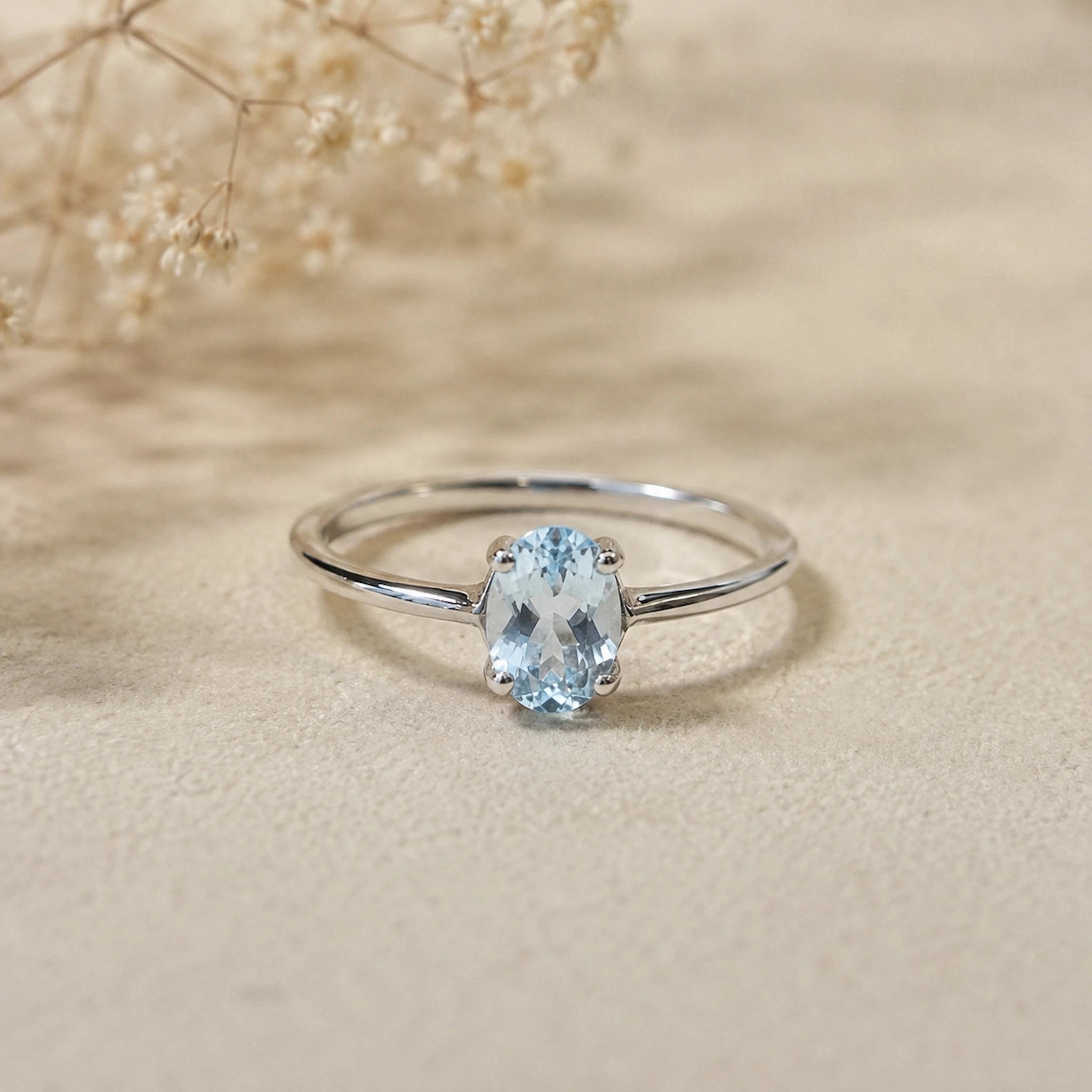 Classic Blue Topaz Oval Solitaire Ring in 925 sterling silver with 5x7mm faceted oval gemstone and four-prong setting