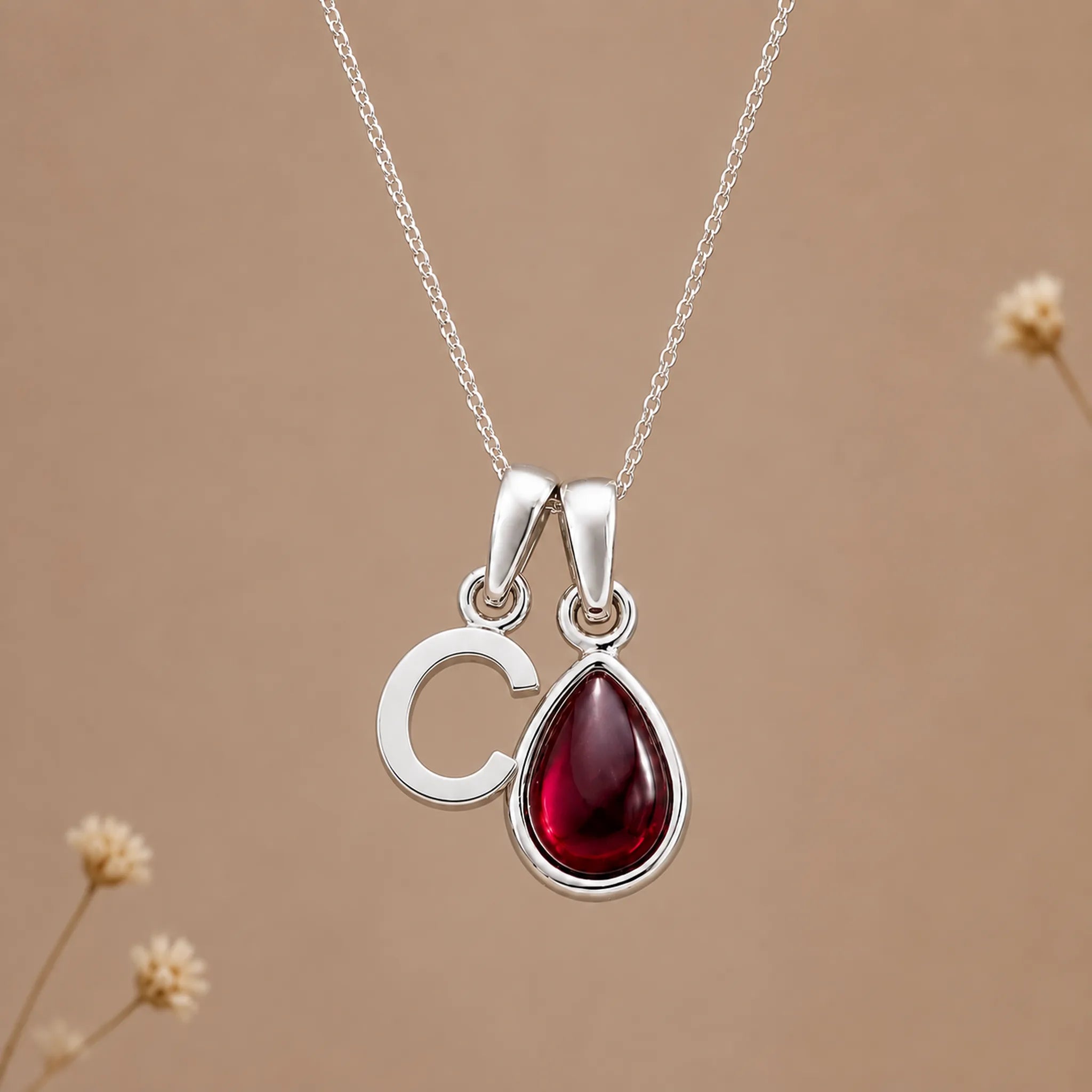 Sterling silver initial C necklace with a natural January garnet