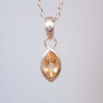 sterling silver citrine necklace with natural faceted marquise shaped citrine gemstone in minimalist boho design