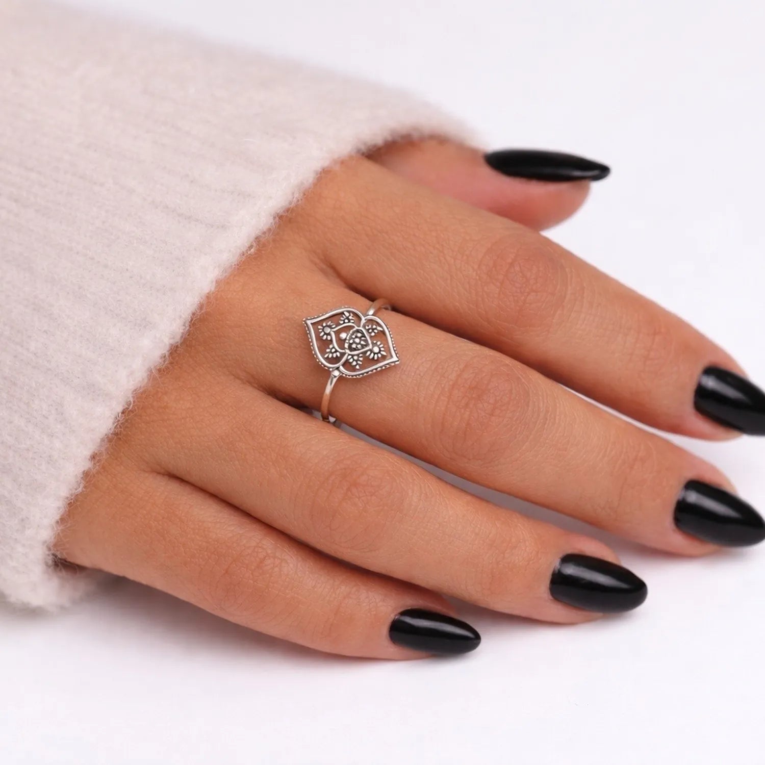 Sterling silver dainty ring being worn