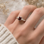 Sterling Silver Emerald-Cut Natural Garnet Gemstone Ring being worn on a finger