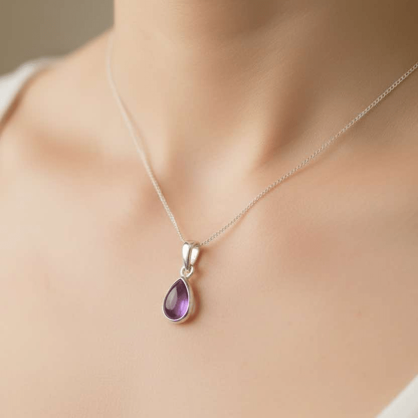 Sterling silver necklace with tear drop amethyst gemstone being worn