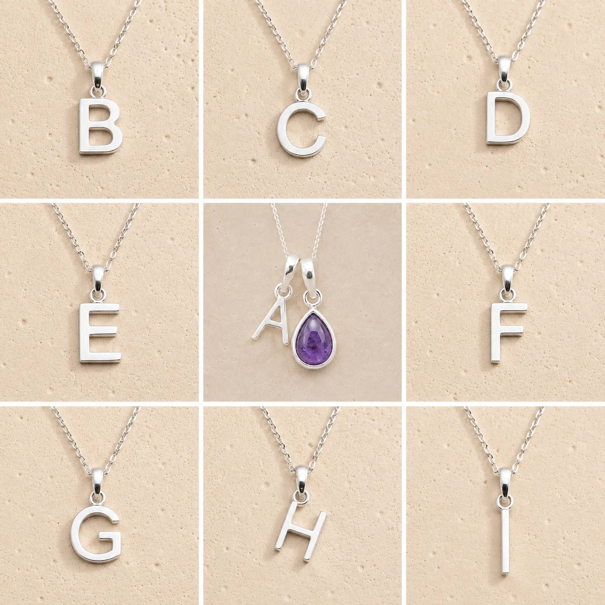 Collection of silver necklaces with initial pendant A to I on a beige background as personalised letter options to add to a February Birthstone Amethyst Necklace.