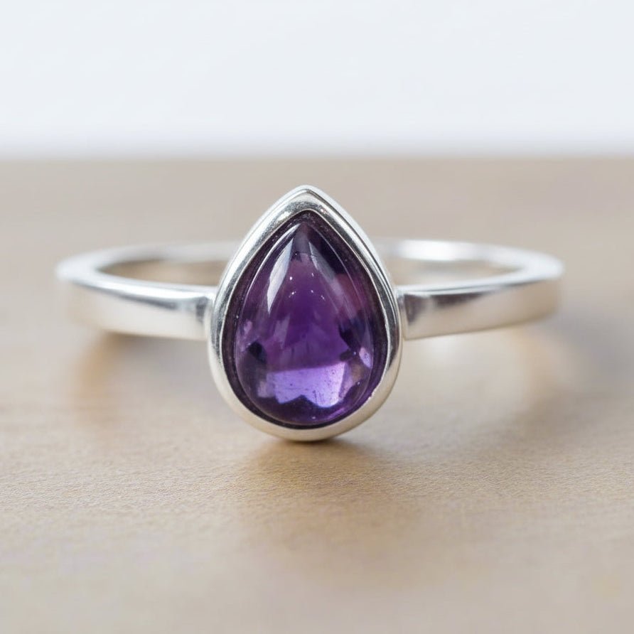 Sterling Silver February birthstone ring with pear-shaped natural amethyst gemstone as a meaningful birthstone jewellery gift for her