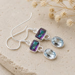 sterling silver french hook earrings with oval natural blue topaz and mystic quartz crystals