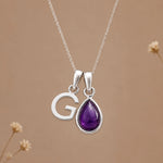 Sterling silver initial G necklace with a February amethyst pendant
