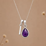 Sterling silver initial I necklace with a February amethyst pendant