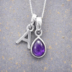 Sterling Silver February birthstone Necklace with a pear-shaped natural Amethyst gemstone pendant and letter 'A' charm