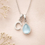 Sterling Silver March birthstone Necklace with a pear-shaped natural Aquamarine gemstone pendant and letter 'C' charm