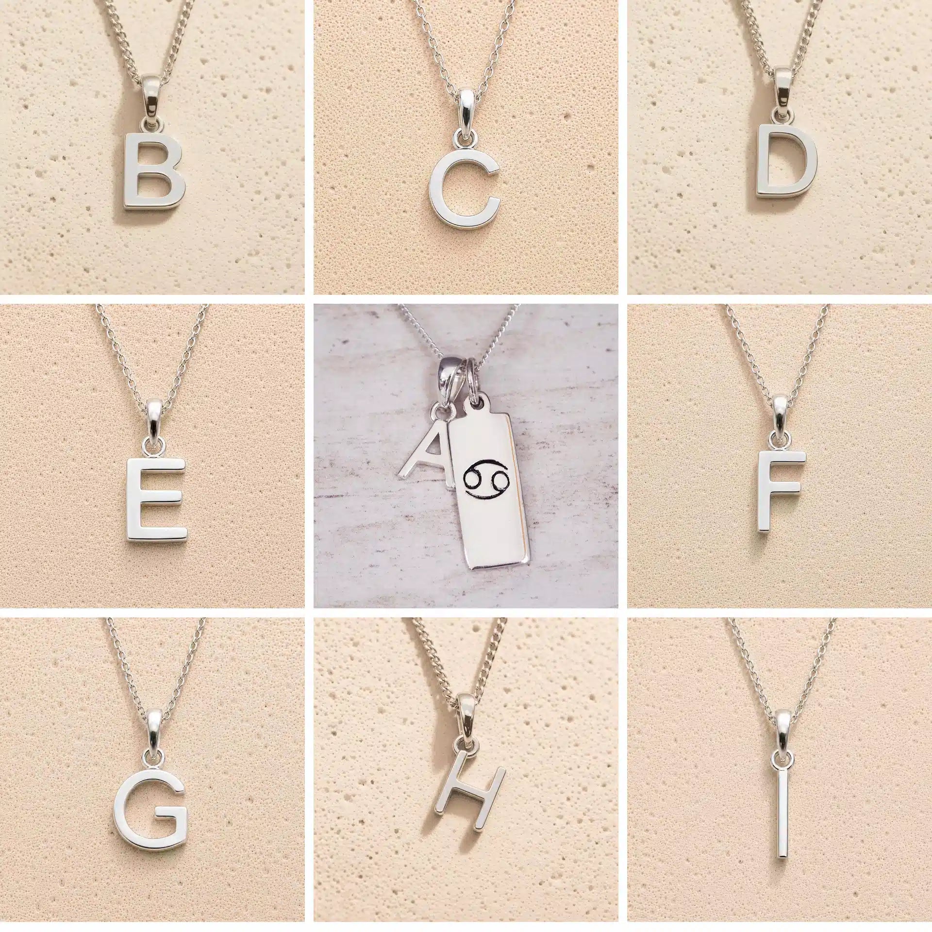 Silver letter pendants from B to H on a beige background as personalised letter options for the Cancer Zodiac Necklace