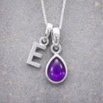 Sterling Silver February birthstone Necklace with a pear-shaped natural Amethyst gemstone pendant and letter 'E' charm