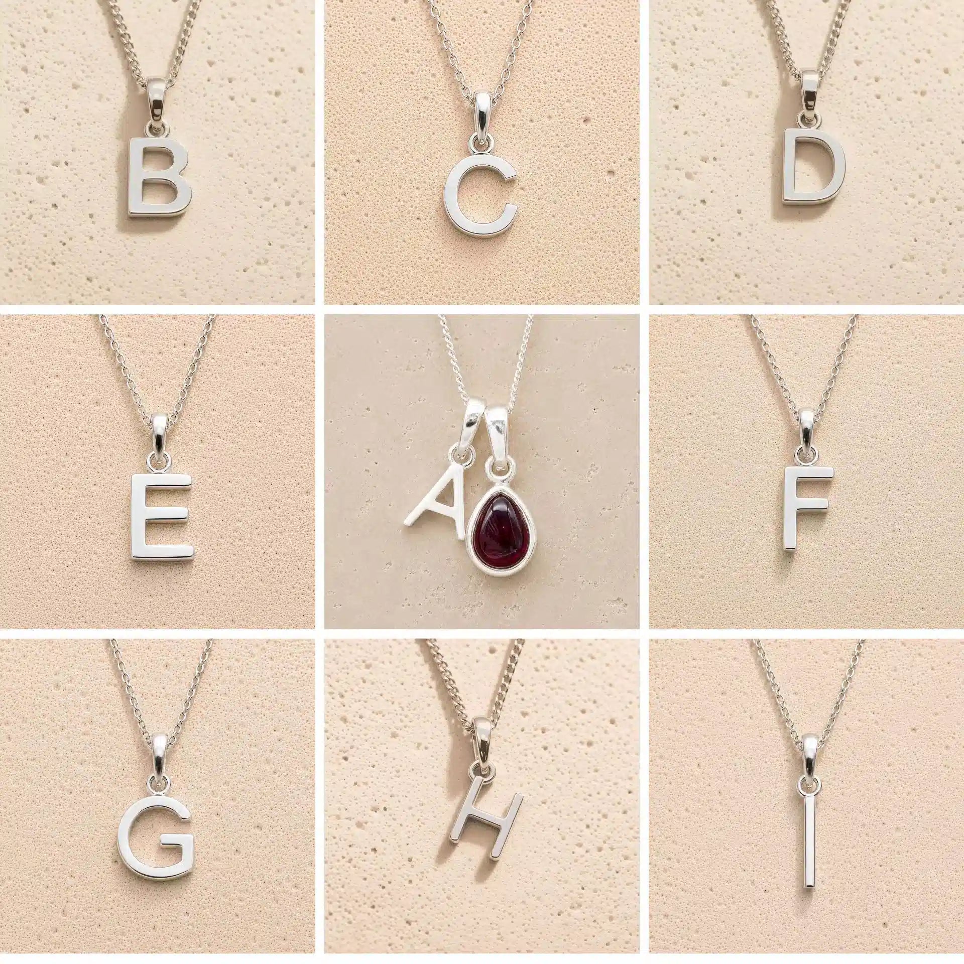 Collection of silver letter pendants a, b, c, d, e, f, g, h, i on a beige background as personalised initial options for a January Birthstone Natural Garnet Gemstone Necklace.
