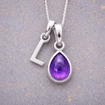 Sterling Silver February birthstone Necklace with a pear-shaped natural Amethyst gemstone pendant and letter 'L' charm