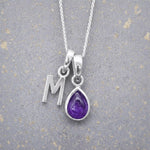 Sterling Silver February birthstone Necklace with a pear-shaped natural Amethyst gemstone pendant and letter 'M' charm