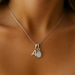 Sterling silver initial and October birthstone opal necklace by indie and Harper Australia 