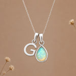 Silver G initial and October birthstone opal necklace