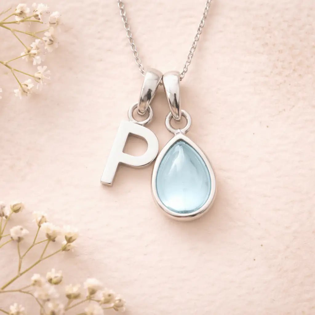 Sterling Silver March birthstone Necklace with a pear-shaped natural Aquamarine gemstone pendant and letter 'P' charm