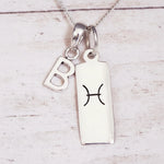 Sterling Silver Double pendant necklace with a letter B pendant and a rectangle pendant with the pisces zodiac glyph.