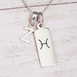 Sterling Silver Double pendant necklace with a letter Z pendant and a rectangle pendant with the pisces zodiac glyph.
