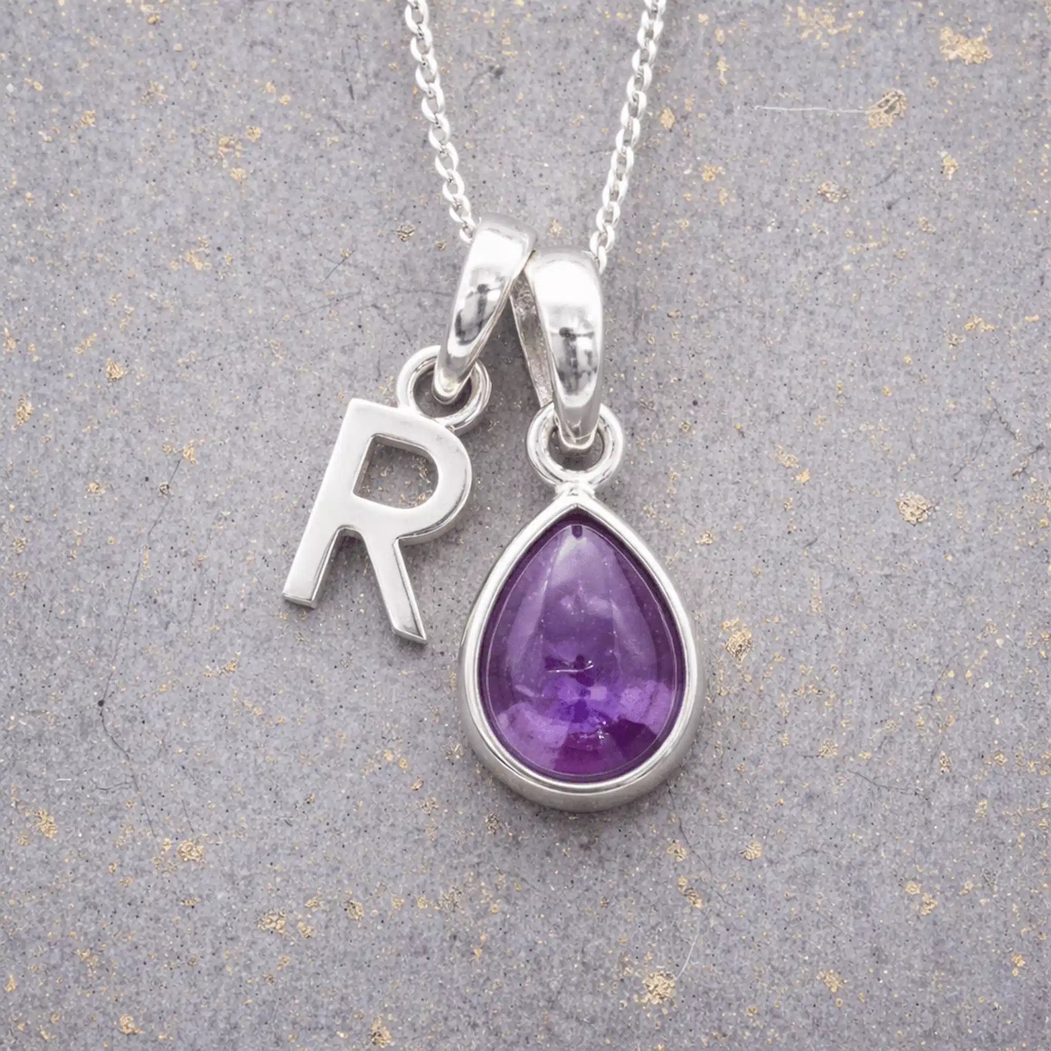 Sterling Silver February birthstone Necklace with a pear-shaped natural Amethyst gemstone pendant and letter 'R' charm