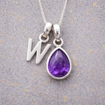 Sterling Silver February birthstone Necklace with a pear-shaped natural Amethyst gemstone pendant and letter 'W' charm