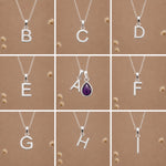 Collection of silver necklaces with initial pendant A to I on a beige background as personalised letter options to add to a February Birthstone Amethyst Necklace.