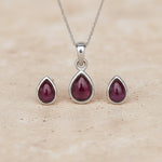Sterling Silver January Birthstone Garnet Jewellery Set including pear-shaped Garnet stud earrings and pendant necklace
