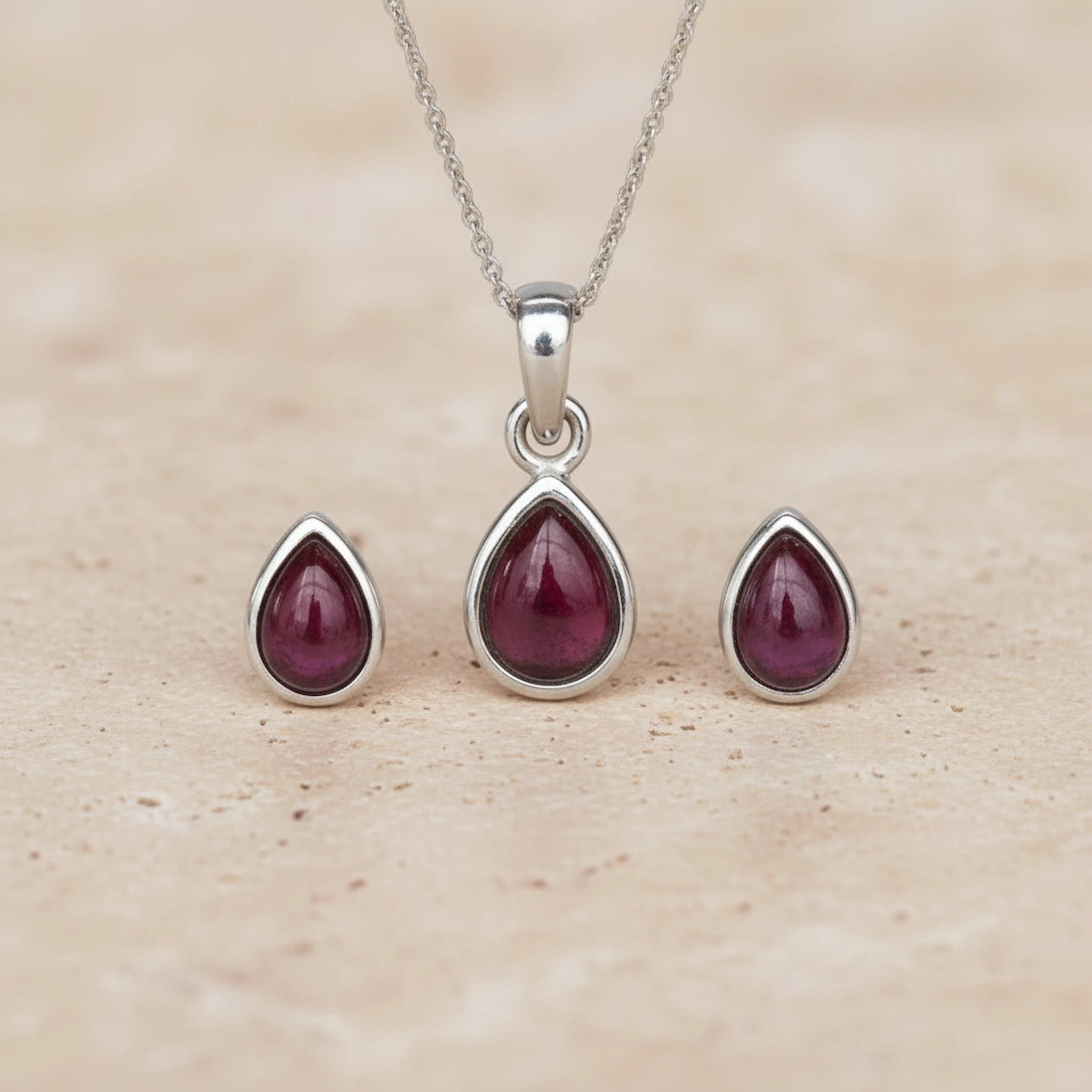 Sterling Silver January Birthstone Garnet Jewellery Set including pear-shaped Garnet stud earrings and pendant necklace