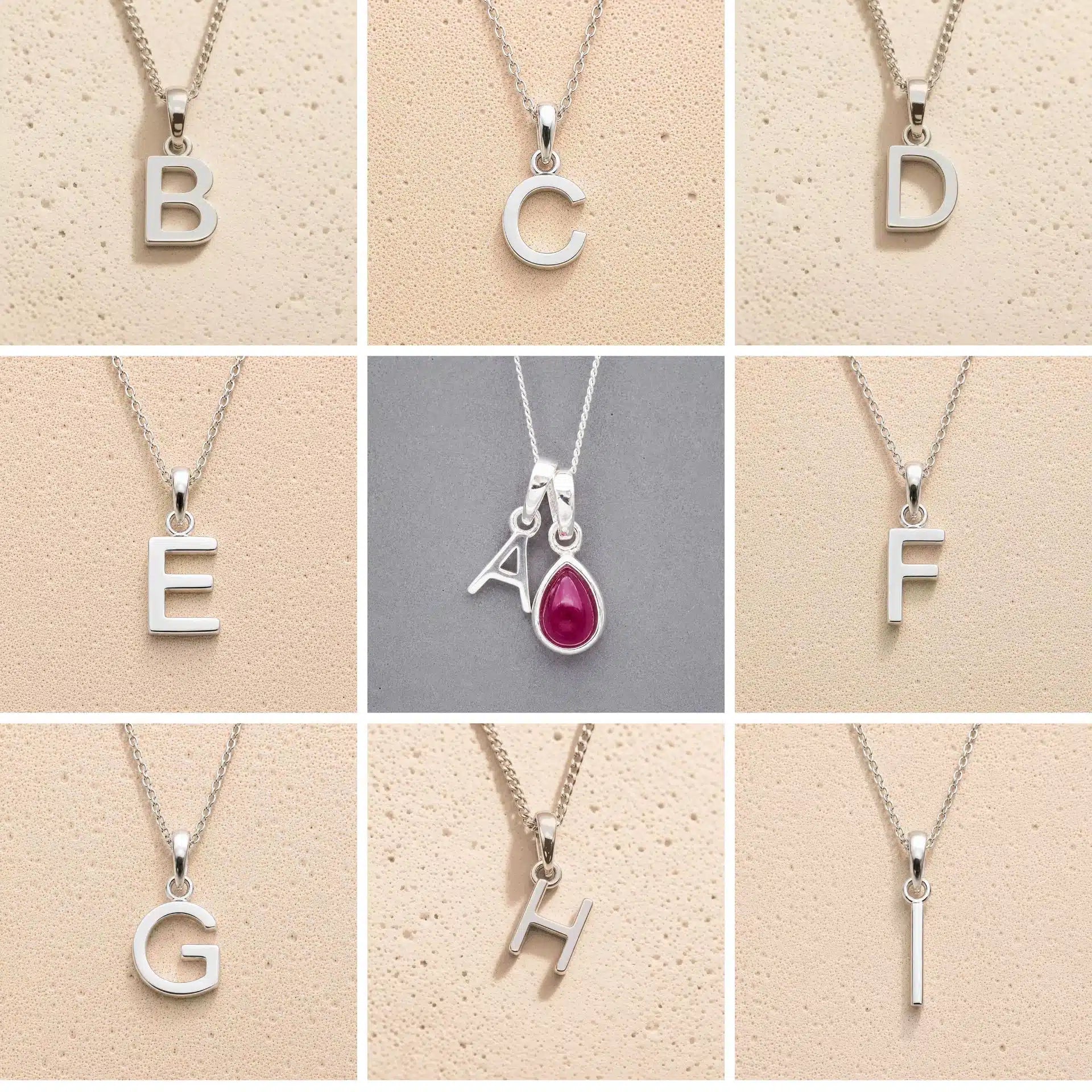 Collection of silver letter pendants A to I on beige and grey backgrounds as personalised initial pendant options for July Birthstone Ruby Necklace.