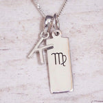 sterling silver initial k virgo zodiac star sign pendant necklace against a light wooden background